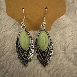 Silver and green stone